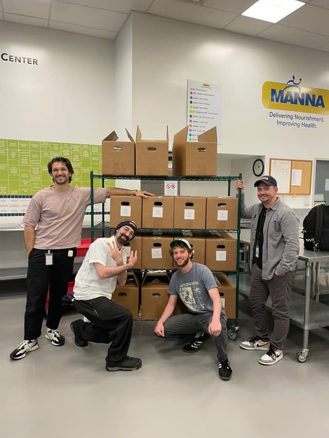 Joe, Chris, Harrison, and Mike with the first group of Client Choice pilot meal boxes.